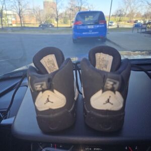 Jordan Kids Black and White High-Top Sneakers